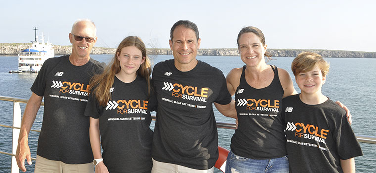 Five members of the Milacci family wearing Cycle for Survival shirts.